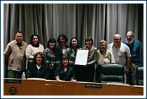 Supervisor Nguyen presents certificate commemorating Mental Health Month.