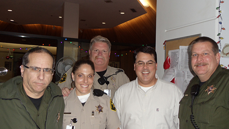 Supervisor Nelson visiting with the Hall of Administration security.