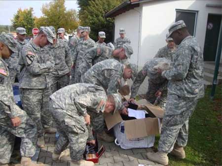 US Army Staff Sgt Marc Arizmendez's Company receives Cigars for Heros package in Germany.