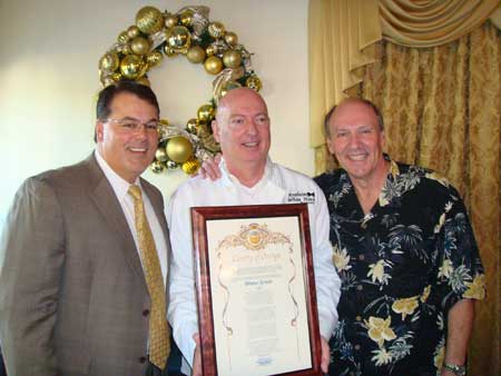 Supervisor Nelson presenting Bruno Serato and Bill Handel commemorative certificates