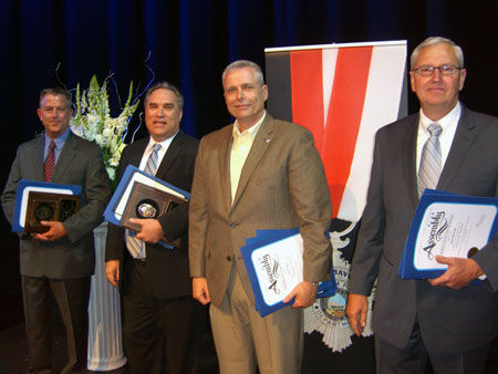 Retiring Anaheim police officers Bill Cowhey, Greg Palmer, Chris Sayers and Stan Ziemelis.