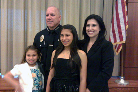 Standing proud with his family is Chief of Buena Park Police DepartmentCorey Sianez.