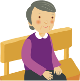 Elderly Lady sitting on a bench.