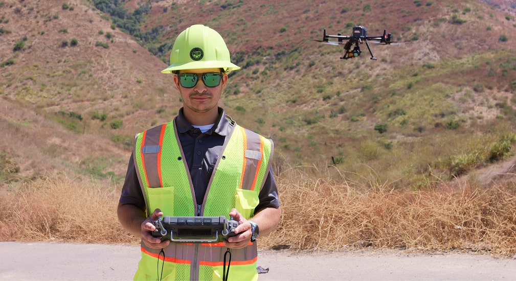 Man operating a drone
